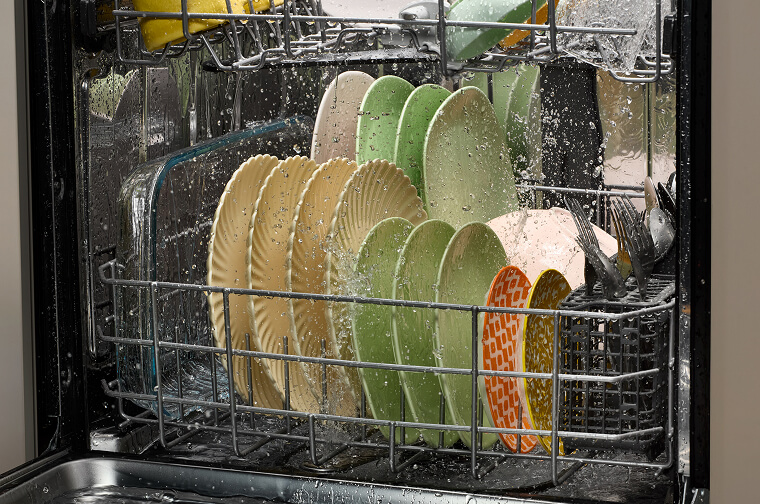Dishes inside of a Whirlpool® Dishwasher