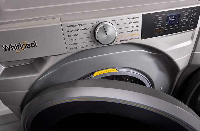 Door of a Whirlpool® Front Load Washer propped open