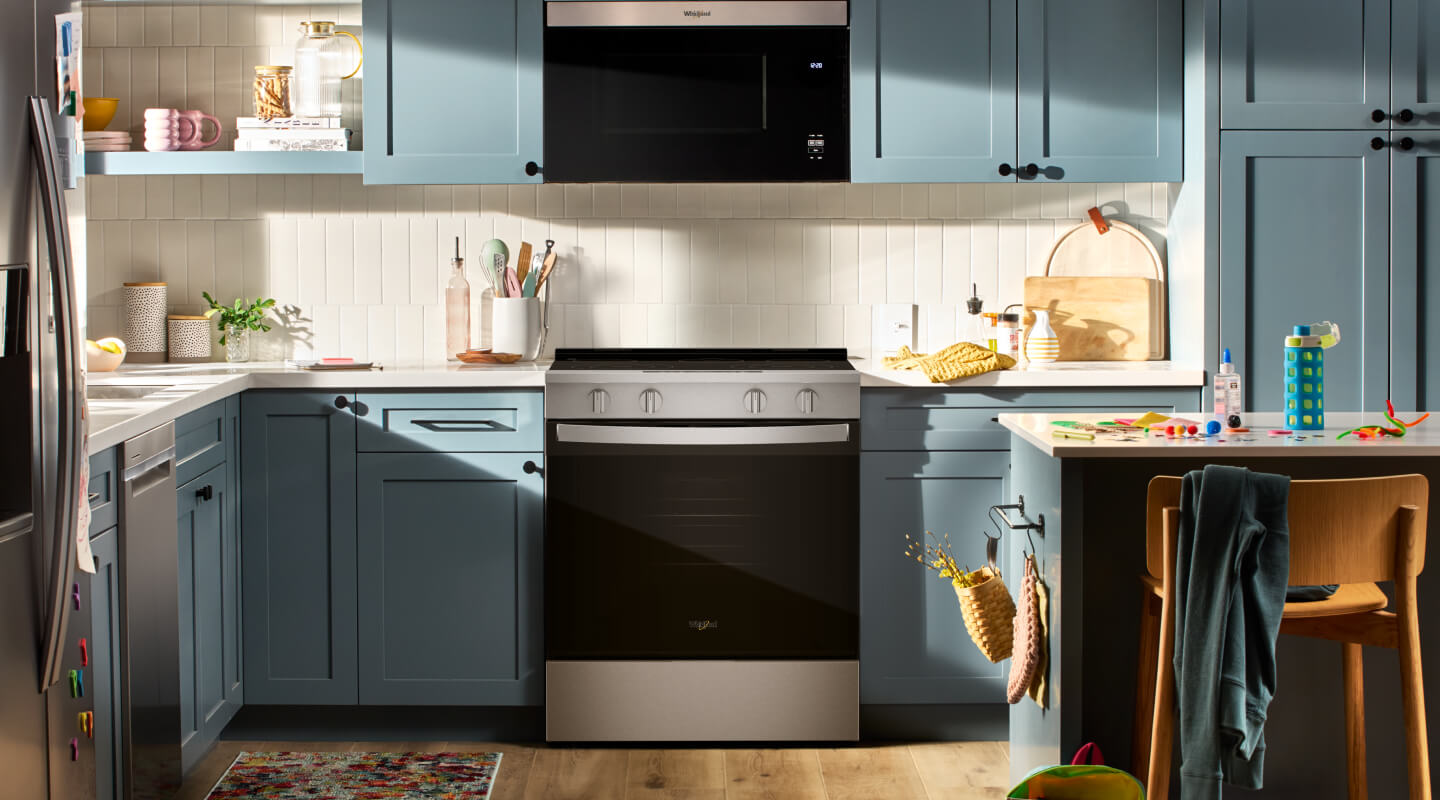 Electric range in a blue kitchen