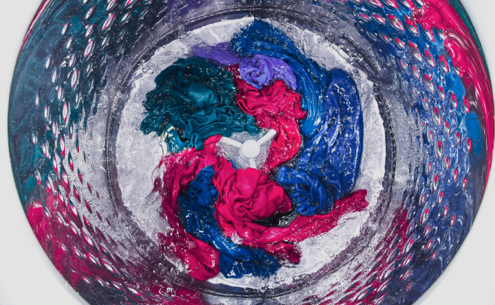 Colorful load of laundry in a washing machine
