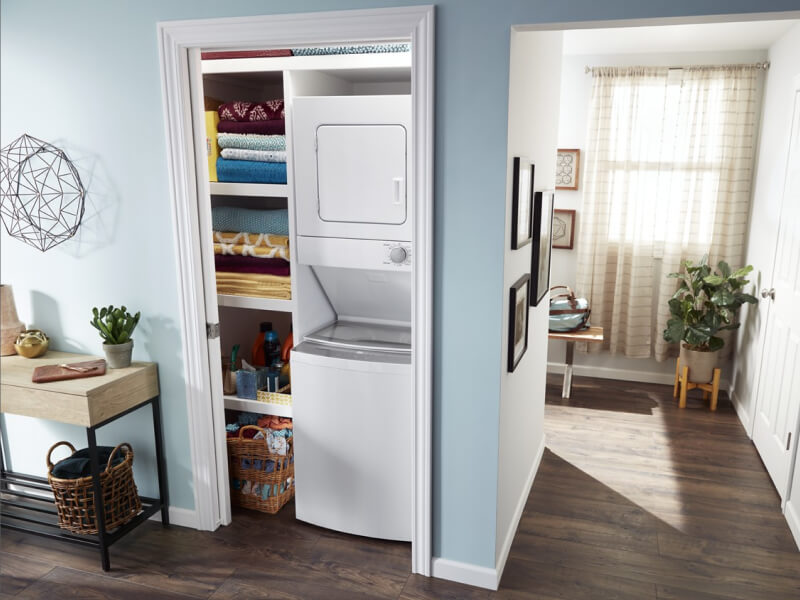 Stacked laundry center in a closet