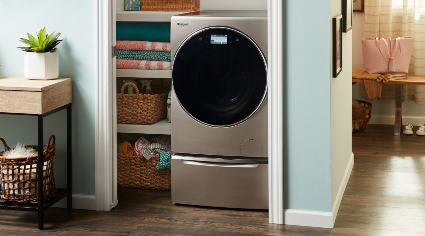 A Whirlpool® all-in-one washer and dryer in a closet A Whirlpool® all-in-one washer and dryer in a closet