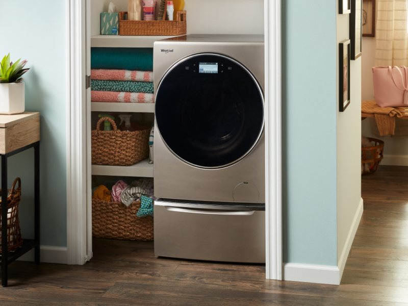 A Whirlpool® all-in-one washer and dryer in a closet A Whirlpool® all-in-one washer and dryer in a closet