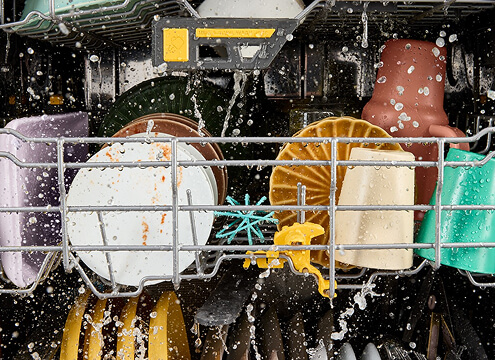 Dishes rinsed clean with Total Coverage Wash Action