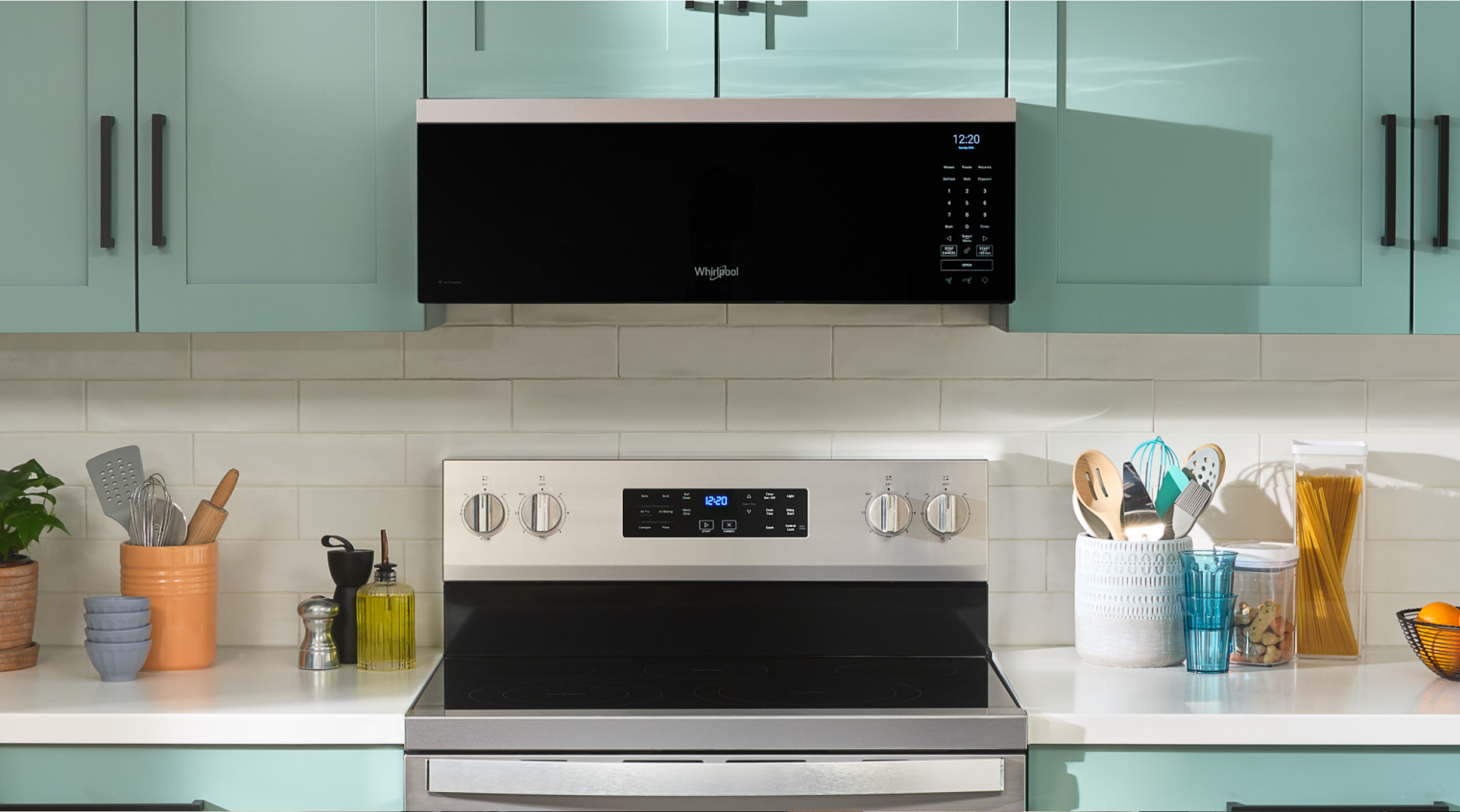 A Whirlpool® Low Profile Over-the-Range Microwave above a Whirlpool® Oven
