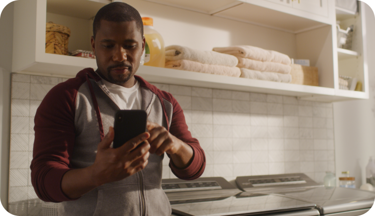 A person using the Whirlpool® App