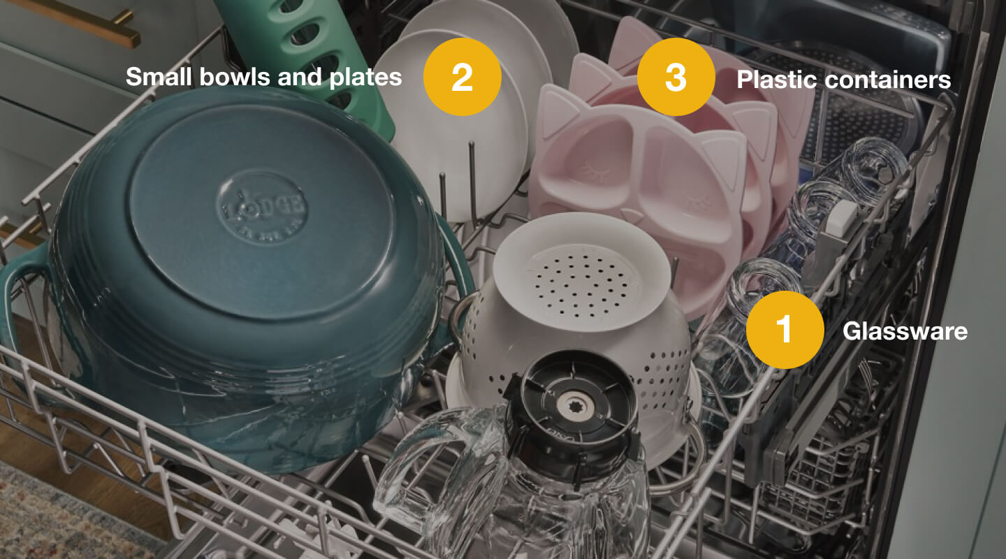 A properly loaded upper rack of a dishwasher