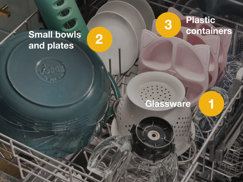 A properly loaded upper rack of a dishwasher