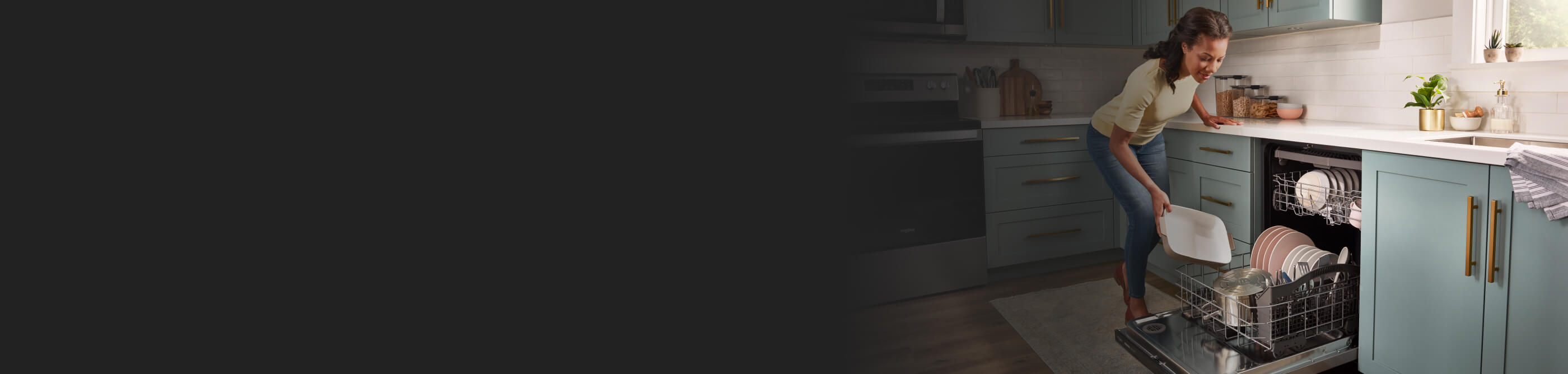 Person loading a dishwasher