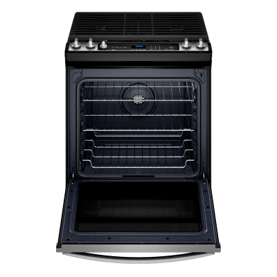 An opened oven with the oven racks displayed.