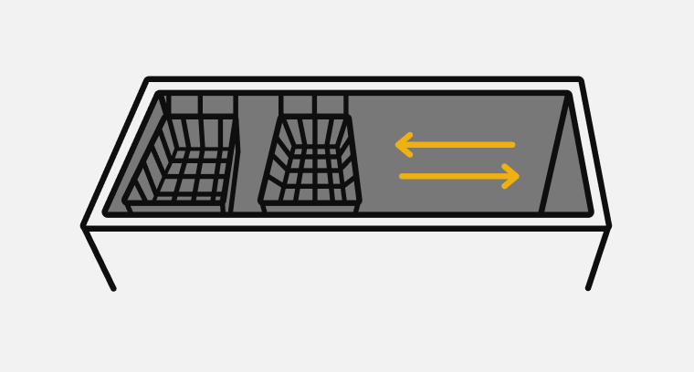 A line drawing of two wire baskets in a chest freezer with arrows