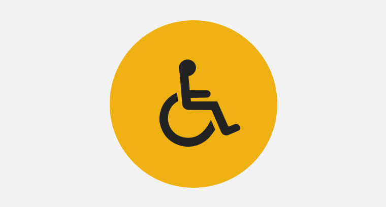 An icon representing a person in a wheelchair
