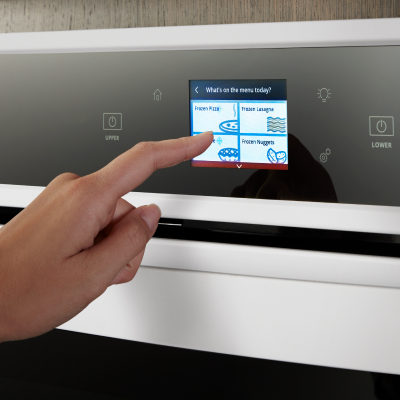 Hand making an oven selection