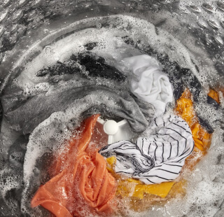 Laundry inside a top load washing machine