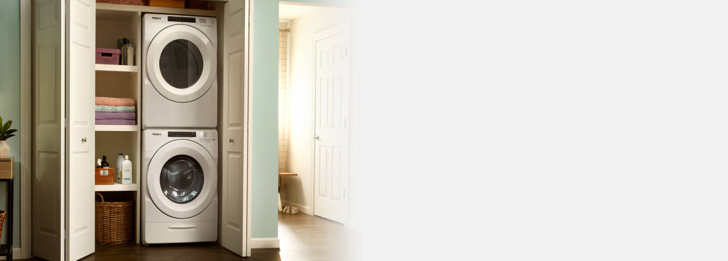 Whirlpool® Stackable Washer and Dryer inside a closet