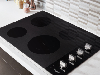 Electric cooktop on a white counter
