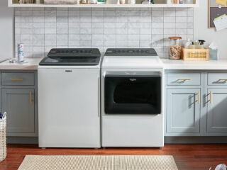 White top load washer and dryer