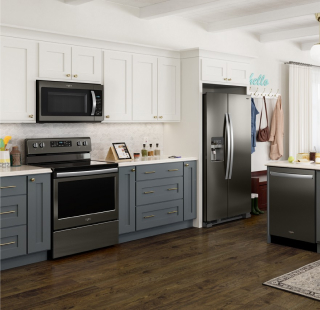 Whirlpool® appliances in a kitchen with blue cabinets