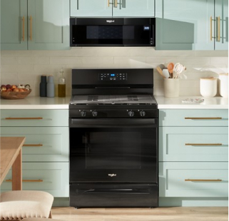 A Whirlpool® Microwave above a Whirlpool® Range