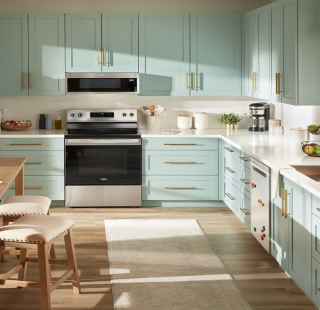 A stainless steel Whirlpool® Microwave and Whirlpool® Range in a kitchen