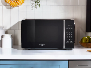 A Whirlpool® Microwave on a countertop