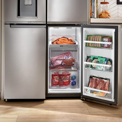 Fully stocked, lower-right freezer compartment of a 4-door refrigerator