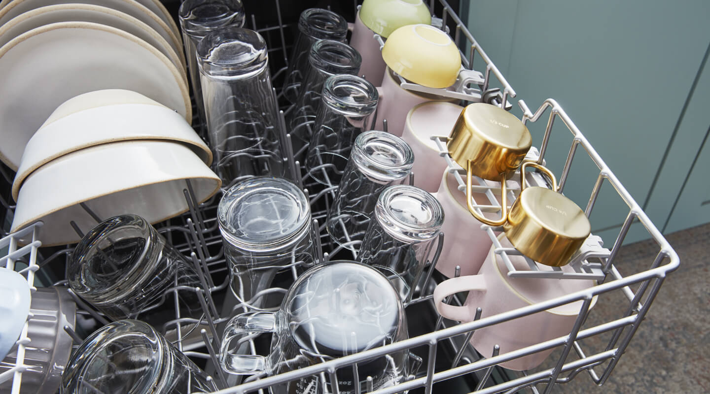 Clean and dried dishes in a dishwasher