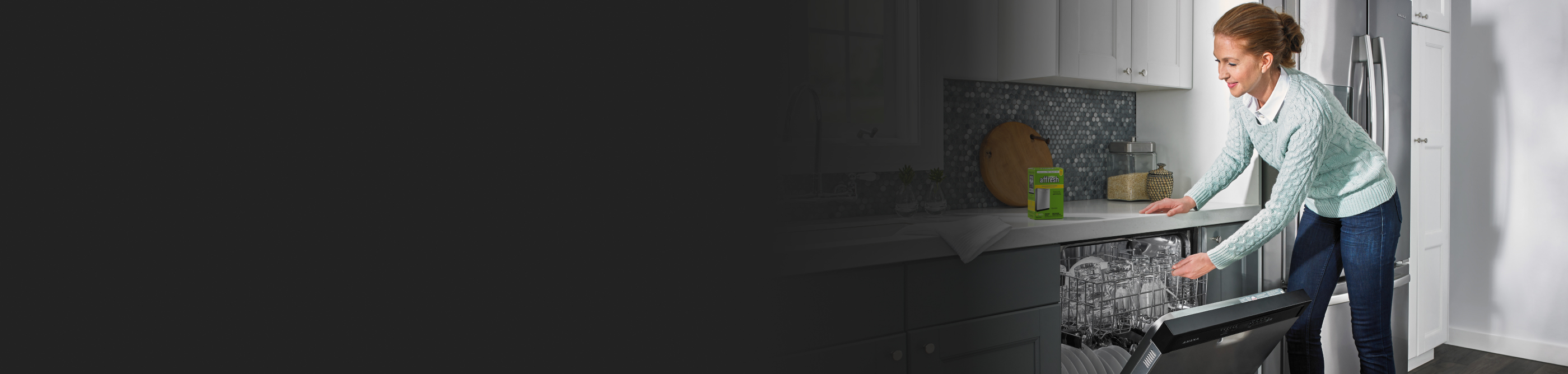 Person loading dishwasher