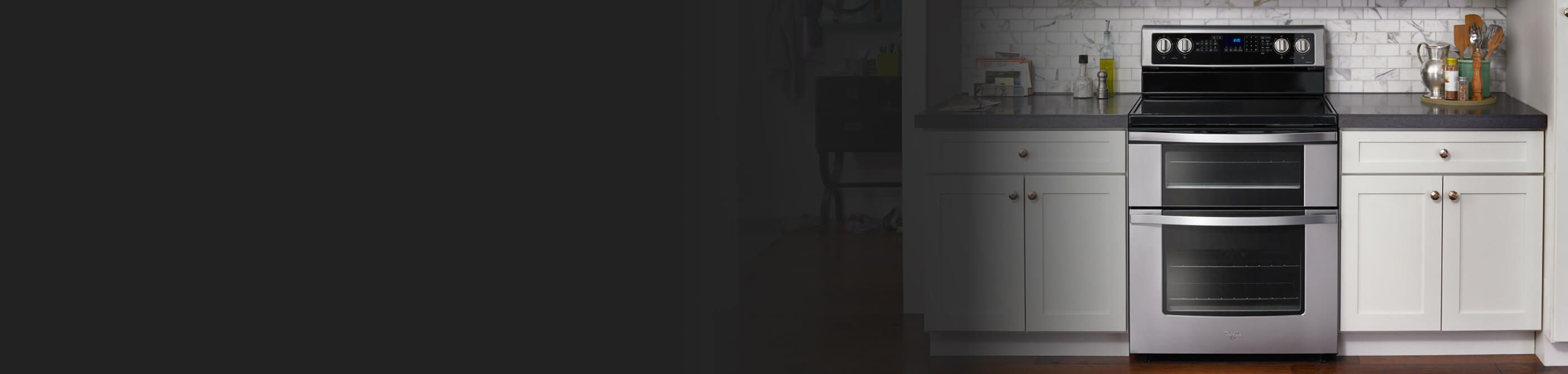 Whirlpool® range set in white cabinetry 