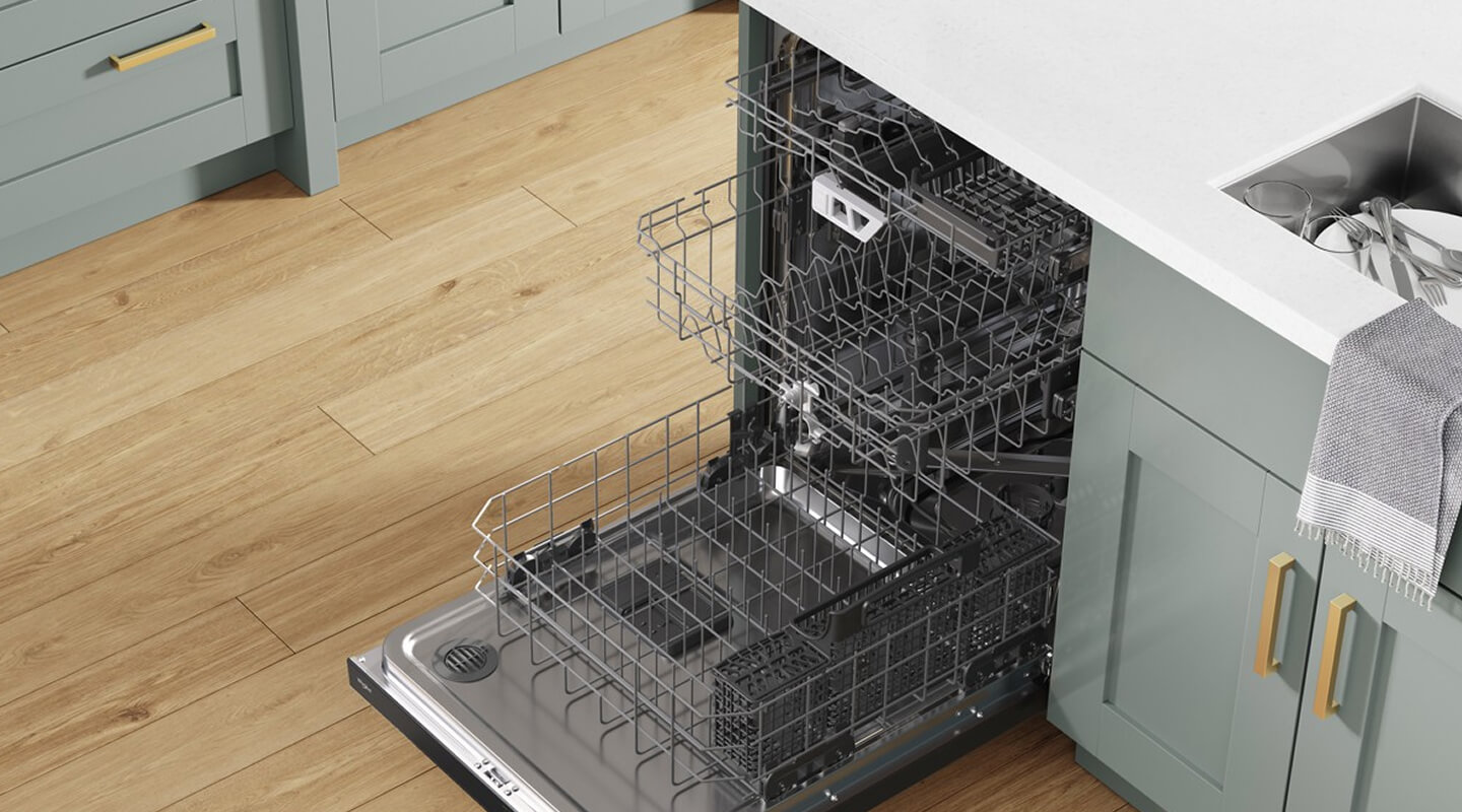 An open and emptied Whirlpool® Dishwasher