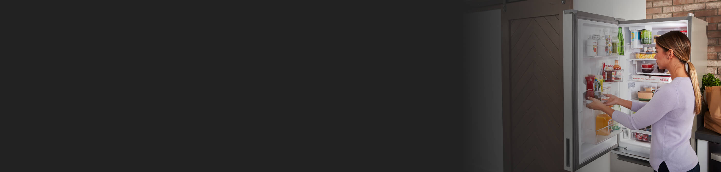 Person removing food from a refrigerator