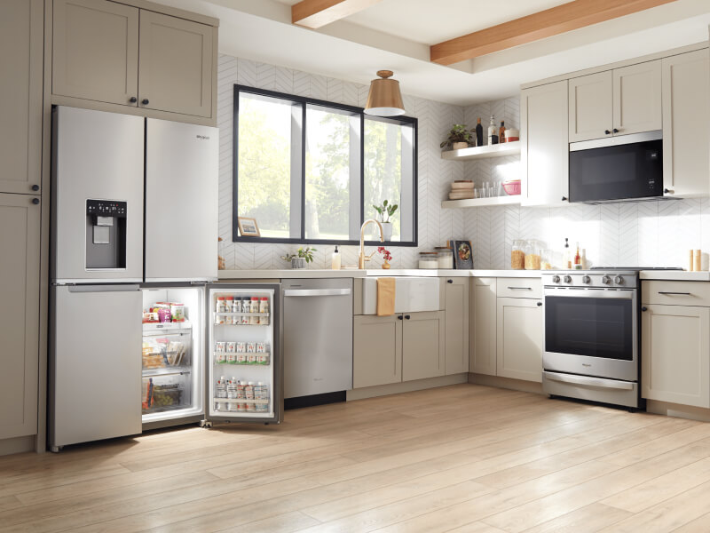 Stainless steel kitchen appliances in a bright kitchen Stainless steel kitchen appliances in a bright kitchen