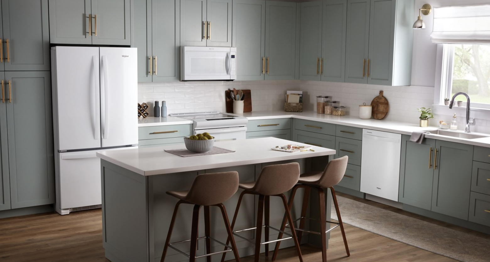 Gray kitchen featuring Whirlpool® appliances in white