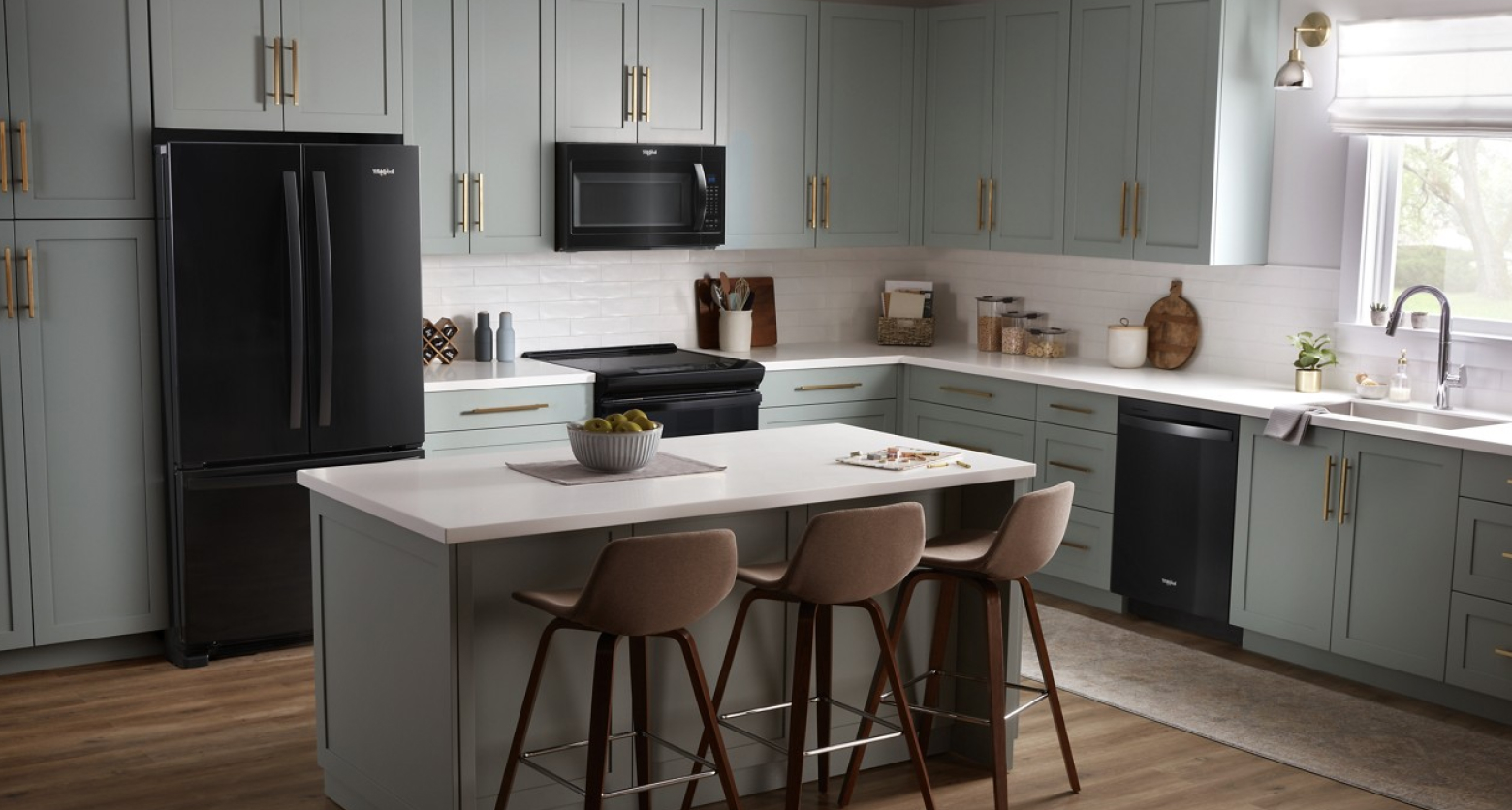 Gray kitchen featuring Whirlpool® appliances in black