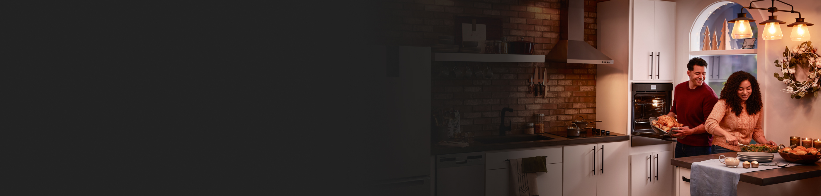 Stainless steel Whirlpool® appliances in a rustic kitchen