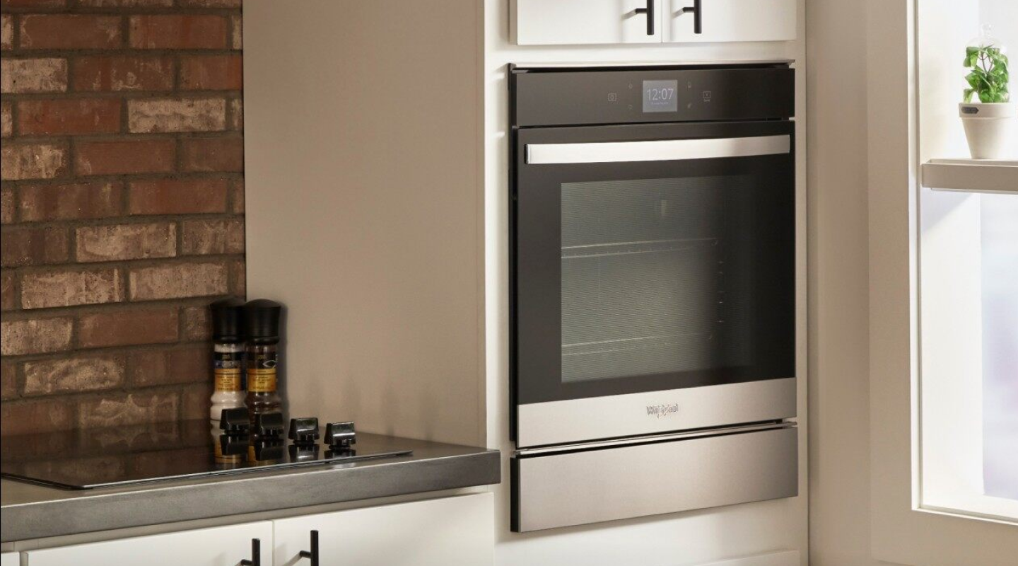 Single wall oven built into cream colored cabinets Single wall oven built into cream colored cabinets