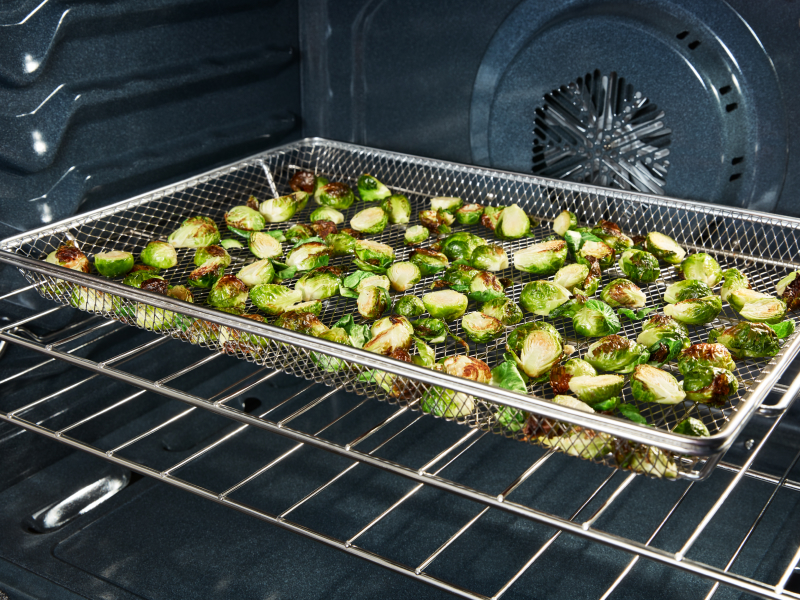 Baked brussel sprouts in an oven Baked brussel sprouts in an oven