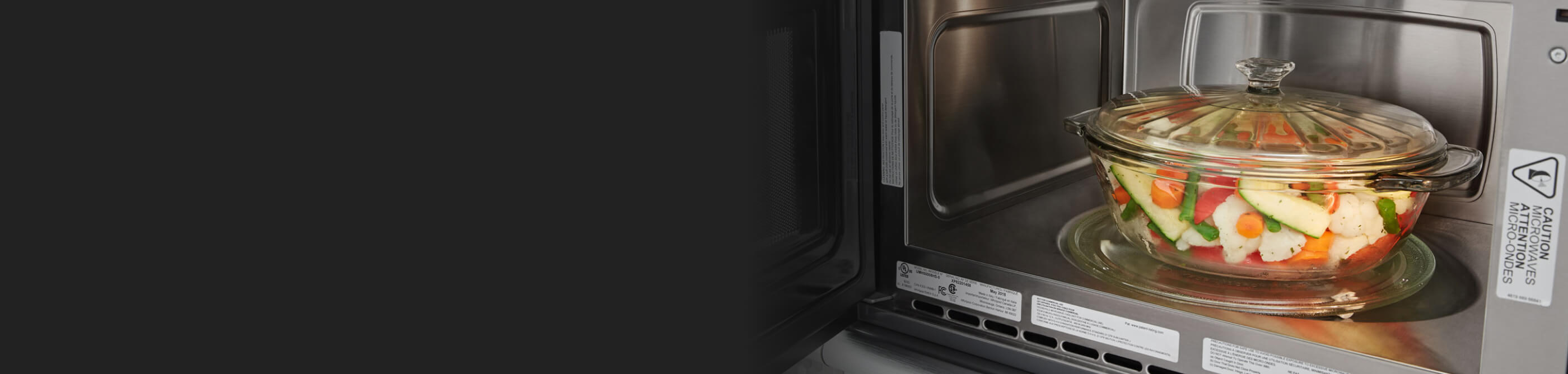 Glass bowl filled with vegetables in Whirlpool® microwave