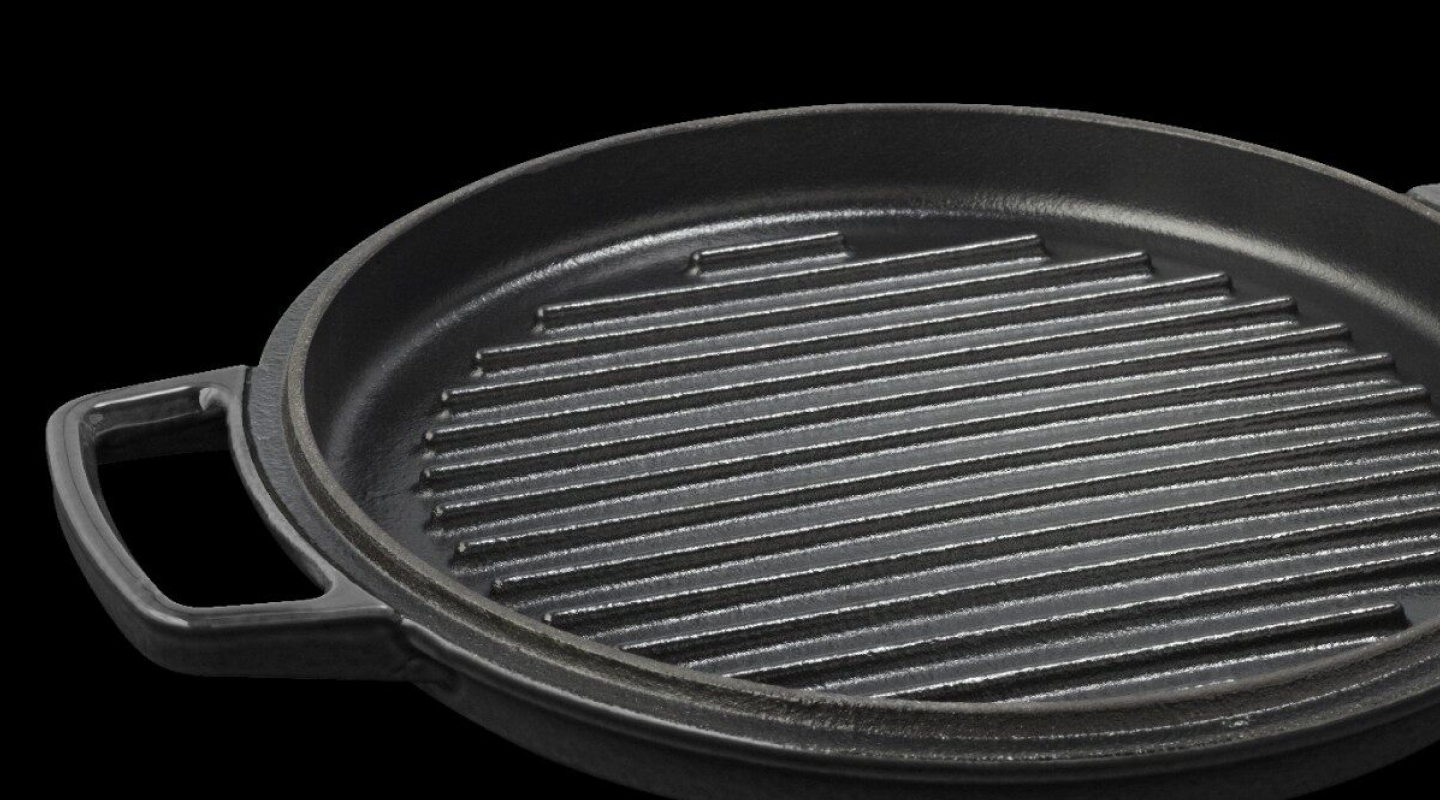 A close up image of a cast iron pan with ridges