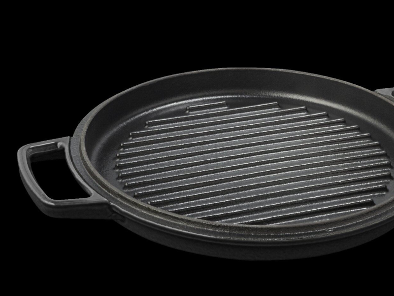 A close up image of a cast iron pan with ridges