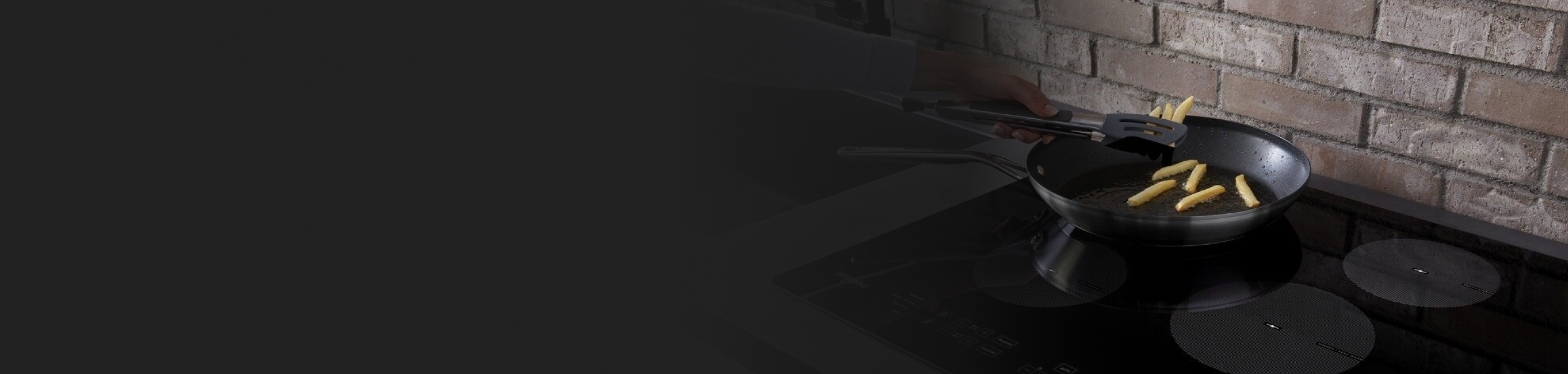 French fries being cooked on an electric stovetop