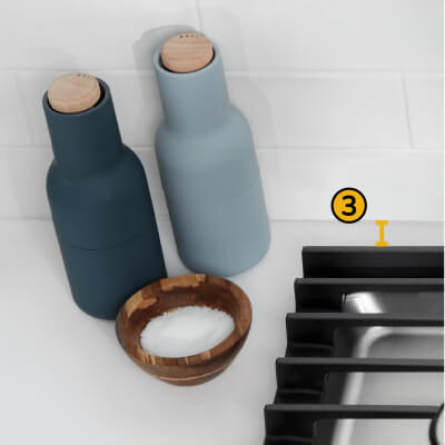 A Whirlpool® Cooktop with the number three