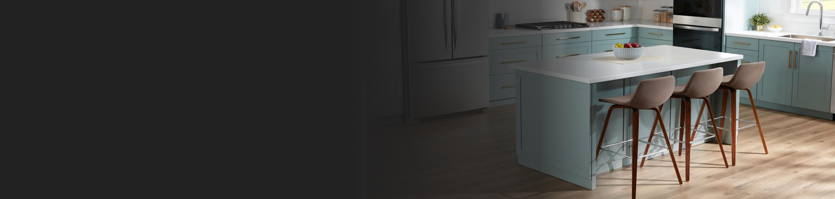 Three stools nestled into a kitchen island