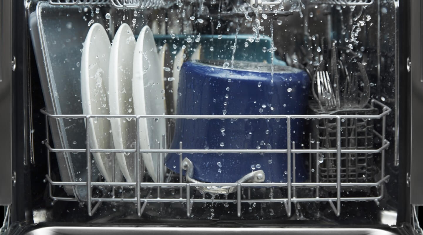 Dishes washing in a dishwasher