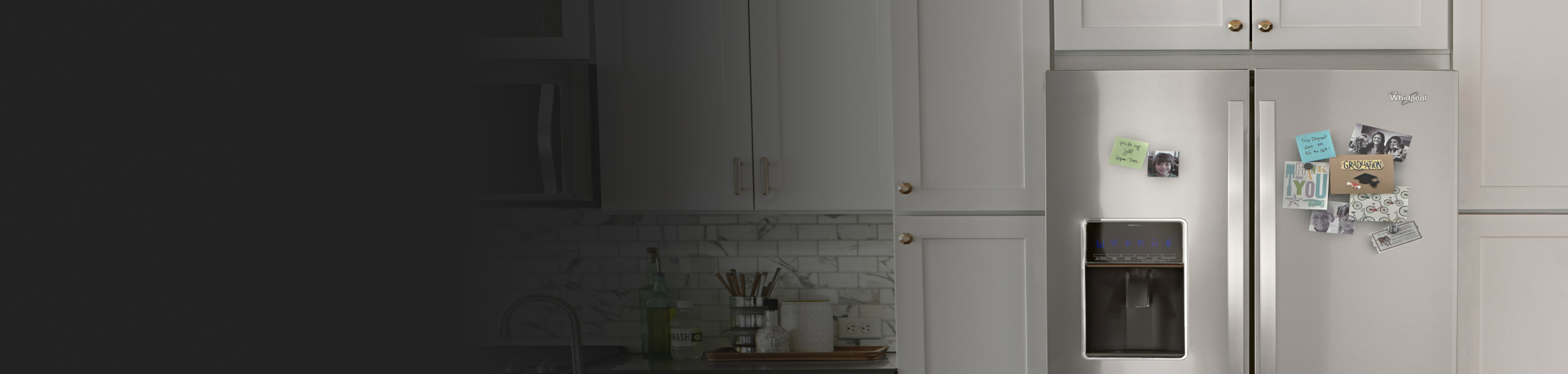 A refrigerator with a photo and note stuck onto it