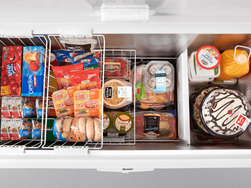 Aerial view of an open white chest freezer Aerial view of an open white chest freezer