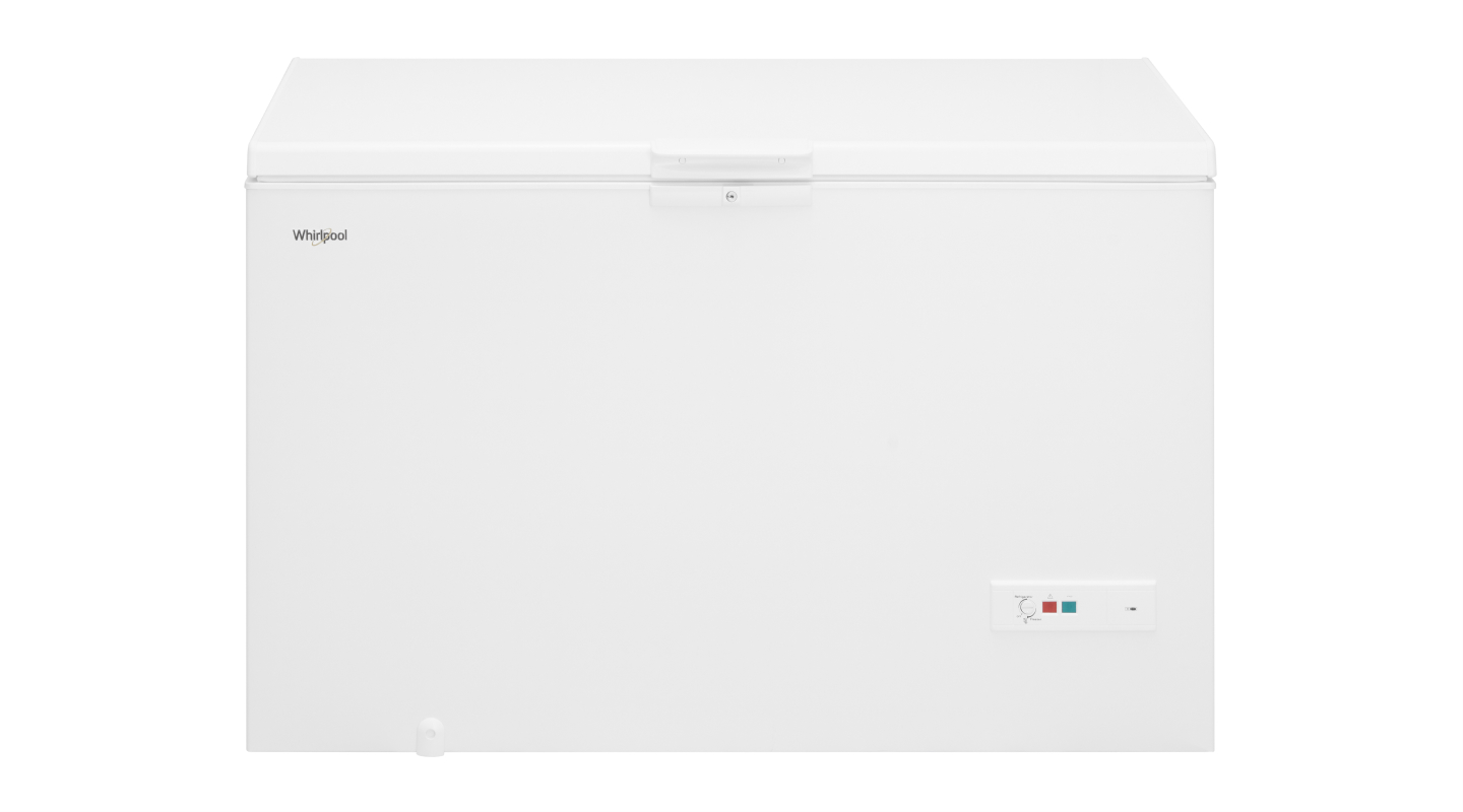 A white chest freezer against a white background A white chest freezer against a white background