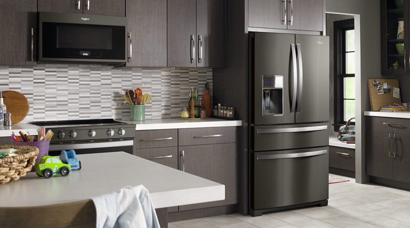 Interior of a family’s kitchen with a 4-door refrigerator