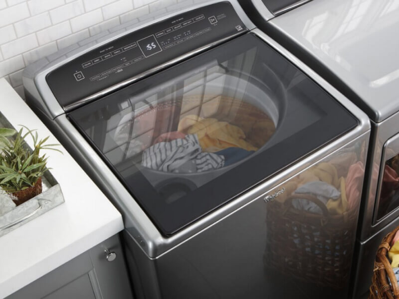 A Whirlpool®  Washer and Dryer placed side by side
