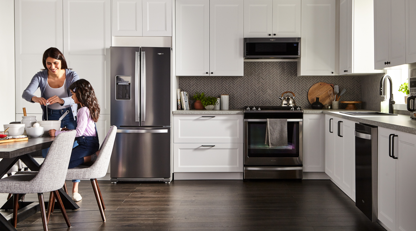 People preparing food at a table
